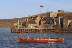 Long ship on Lerwick's coastline